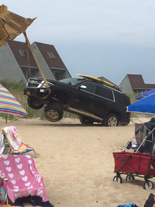 Illustration for article titled Bringing a Chevy Tahoe on a Beach: How to Ruin a Chevy Tahoe